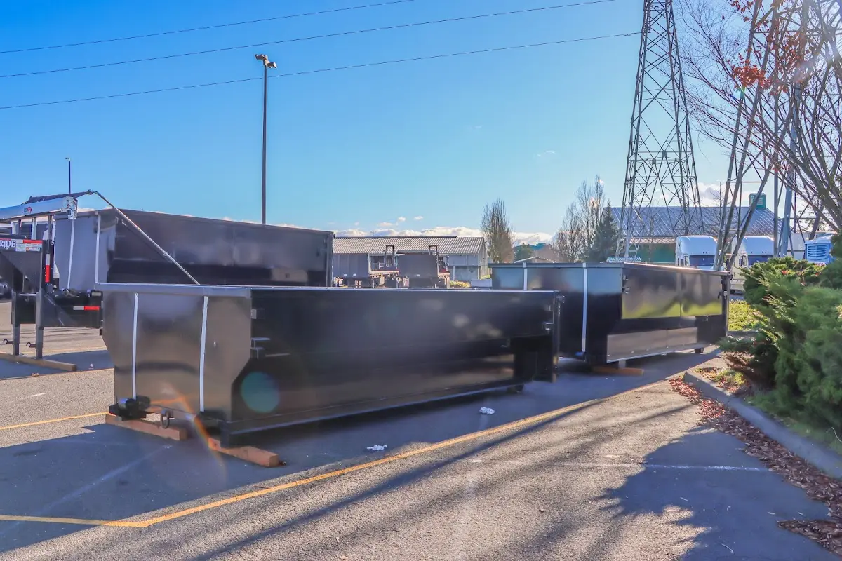 Roll-off dumpster ready for waste disposal at job site for Concrete Dumpster Rental in Port Chester